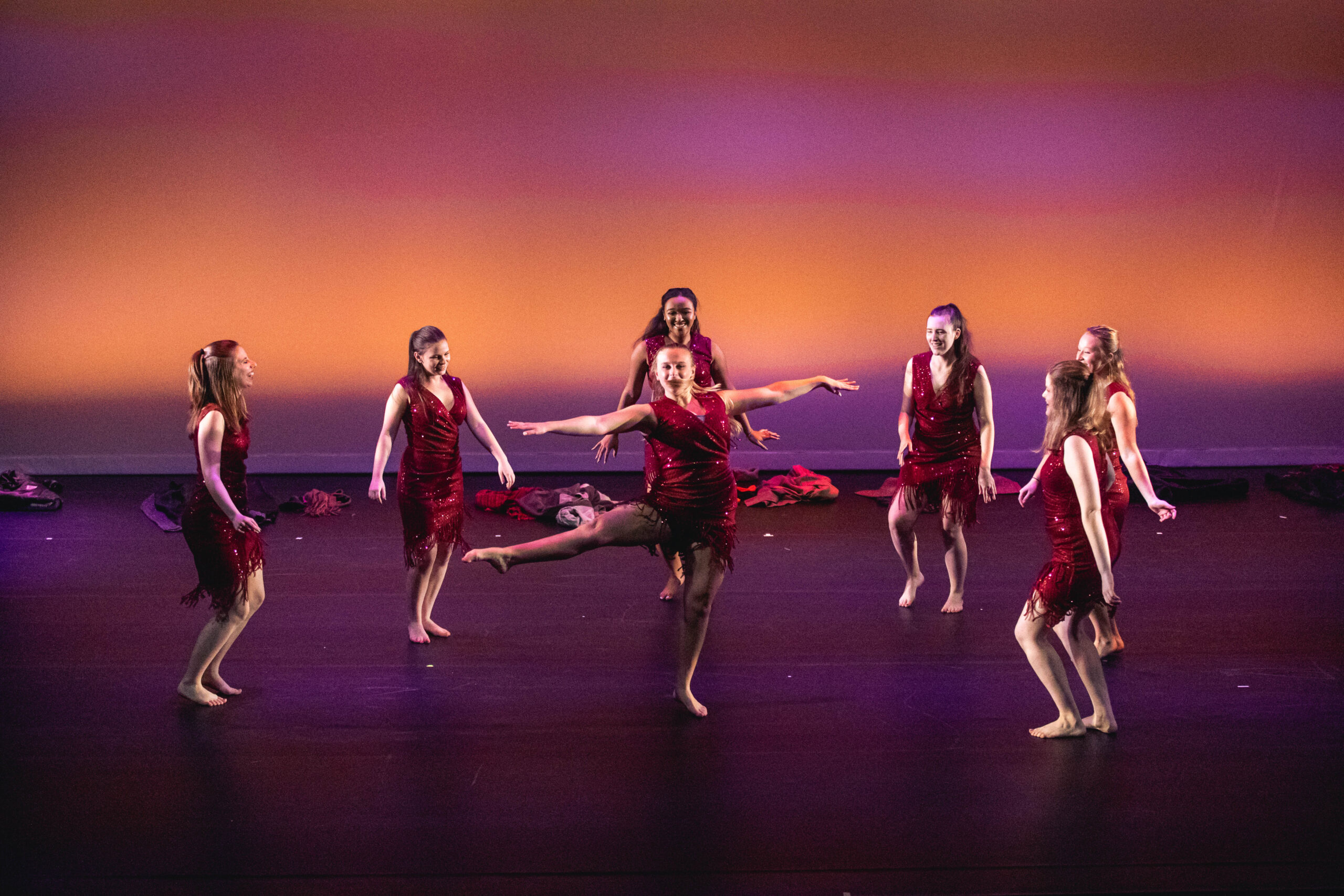 Concentrated Female Athlete In Athletic Attire Performing Dance